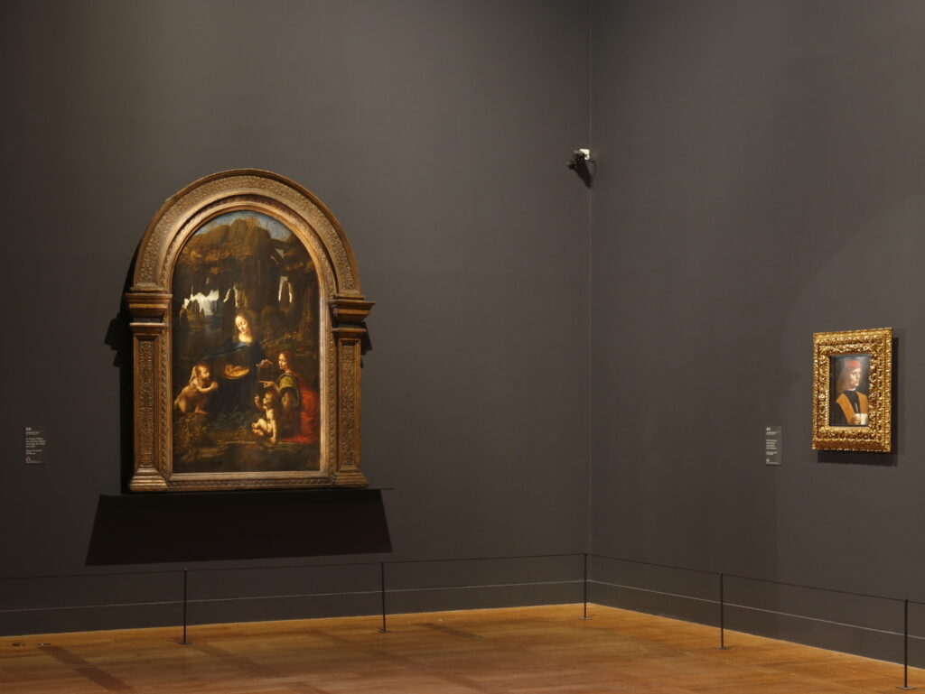 Leonardo da Vinci Exhibition Exposition Léonard de Vinci Virgin of the Rocks La Vierge aux rochers The Musician Le Musicien © Musée du Louvre Antoine Mongodin